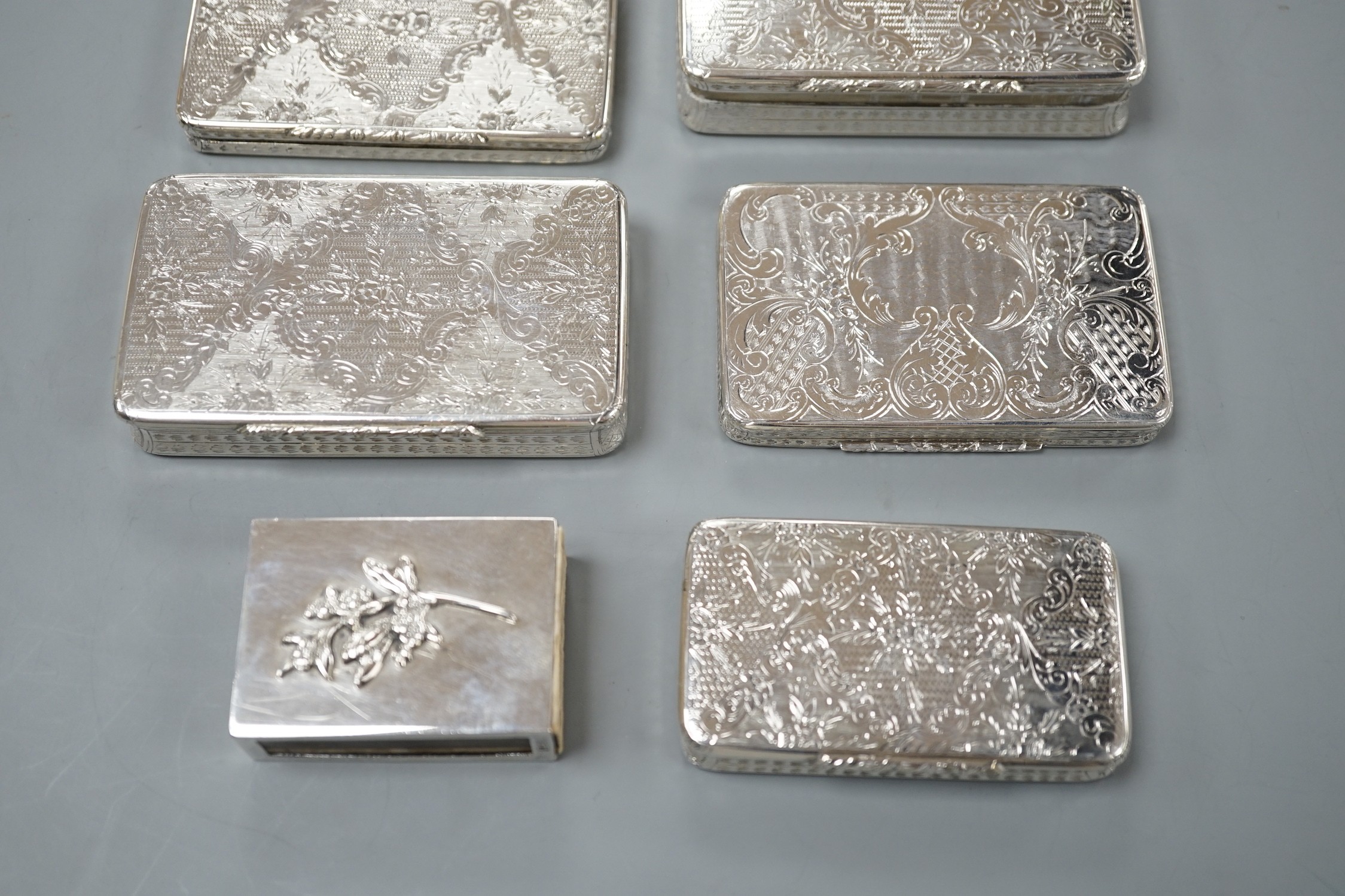 Five similar 20th century Spanish engraved white metal rectangular pill boxes, of varying sizes, largest 92mm and a 925 matchbox sleeve.